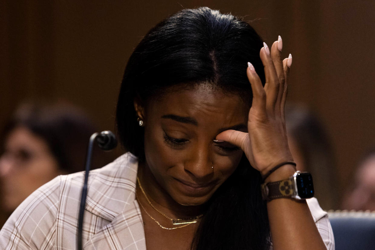 WASHINGTON, DC - SEPTEMBER 15: U.S. Olympic gymnast Simone Biles testifies during a Senate Judiciary hearing about the Inspector General's report on the FBI's handling of the Larry Nassar investigation on Capitol Hill, on September 15, 2021 in Washington, DC. Nassar was charged in 2016 with federal child pornography offenses and sexual abuse charges in Michigan. He is now serving decades in prison after hundreds of girls and women said he sexually abused them under the guise of medical treatment when he worked for Michigan State and Indiana-based USA Gymnastics, which trains Olympians. (Photo by Graeme Jennings-Pool/Getty Images)