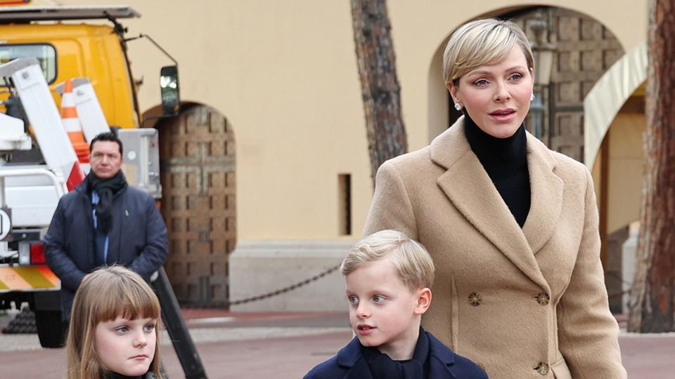 Twins Jacques and Gabriella hold hands as they walked through The Palace Square