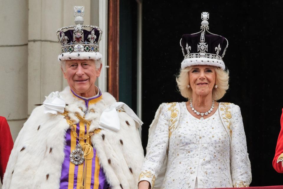 His Majesty The King Charles III and Her Majesty Queen Camilla photographed on the palace balcony during the celebrations of the Coronation of Charles III and Camilla at Buckingham Palace in London, UK on 6 May 2023 . Picture by Julie Edwards.