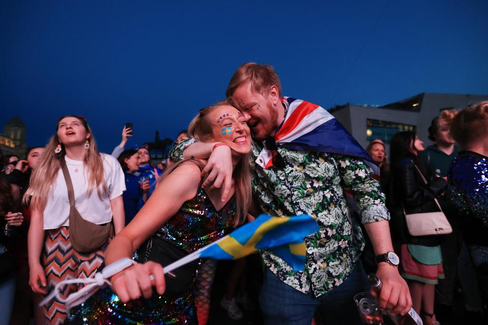 Eurovision fans enjoy the party atmosphere as they gather in Liverpool (Getty Images)
