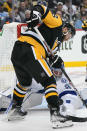 Pittsburgh Penguins' Jason Zucker (16) can't get his stick on a rebound off Tampa Bay Lightning goaltender Andrei Vasilevskiy (88) during the second period of an NHL hockey game in Pittsburgh, Tuesday, Oct. 26, 2021. (AP Photo/Gene J. Puskar)