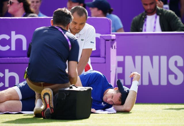 Andy Murray receives treatment