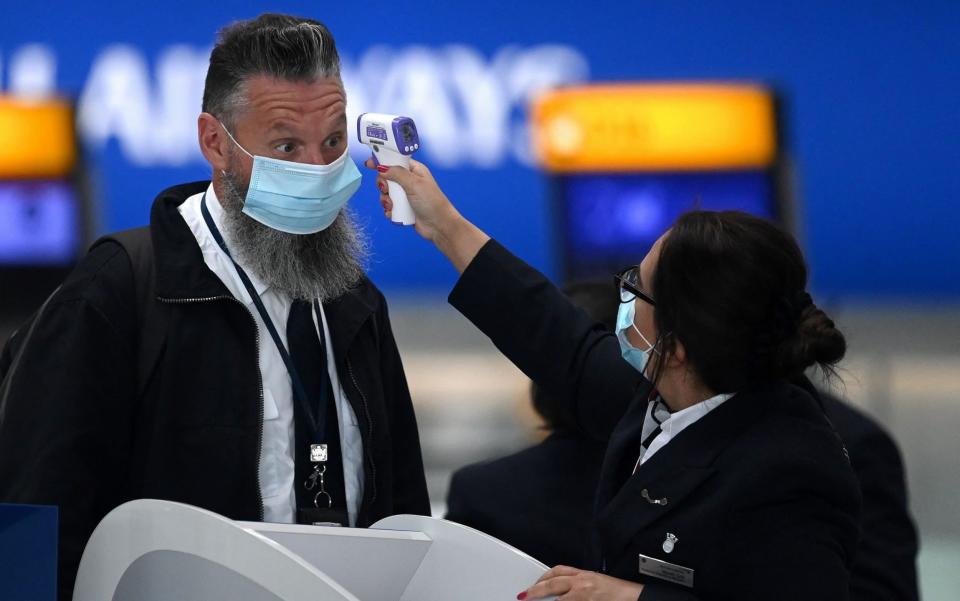 EU face mask airline airport - DANIEL LEAL-OLIVAS / AFP