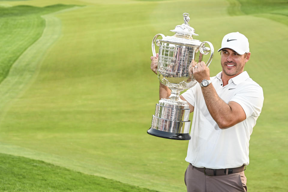 ROCHESTER, NEW YORK - MAY 21: Brooks Koepka smiles with the Wanamaker Trophy following his two stroke victory in the final round of the 2023 PGA Championship at Oak Hill Country Club on May 21, 2023, in Rochester, New York. (Photo by Keyur Khamar/PGA TOUR via Getty Images)