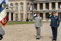In this photo released on May 25, 20121, by the Lebanese Army official website, Lebanese Army Commander Gen. Joseph Aoun, right, and French Army Chief of Staff Gen. Francois Lecointre, left, salute as they visit at the Official Defense College, in Paris, France. The currency collapse has wiped out the salaries of the U.S.-backed Lebanese military, placed unprecedented pressure on the army's operational capabilities with some of the highest attrition rates over the past two years, and raised concerns about its ability to continue playing a stabilizing role while sectarian tensions and crime are on the rise.(Lebanese Army Website via AP)