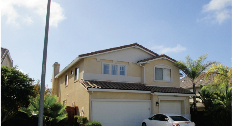 Example of a home with a living space over a garage, which can be vulnerable to collapse in an earthquake.