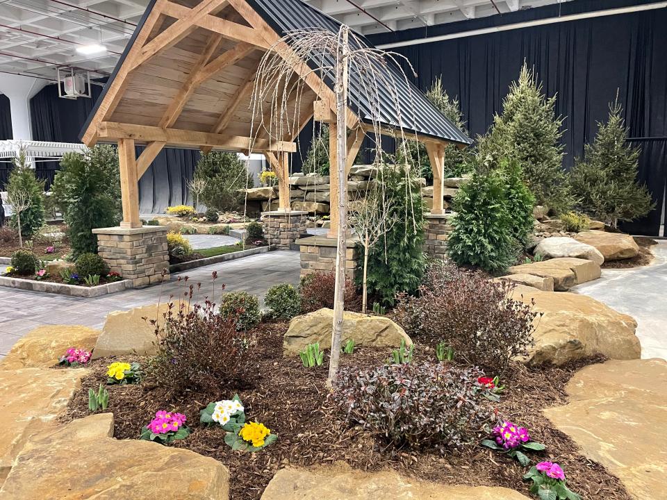 Natural Falls Construction in Copley Township drew from the movie "Unforgiven" for the inspiration for its showcase garden at the Great Big Home + Garden Show at the I-X Center in Cleveland.