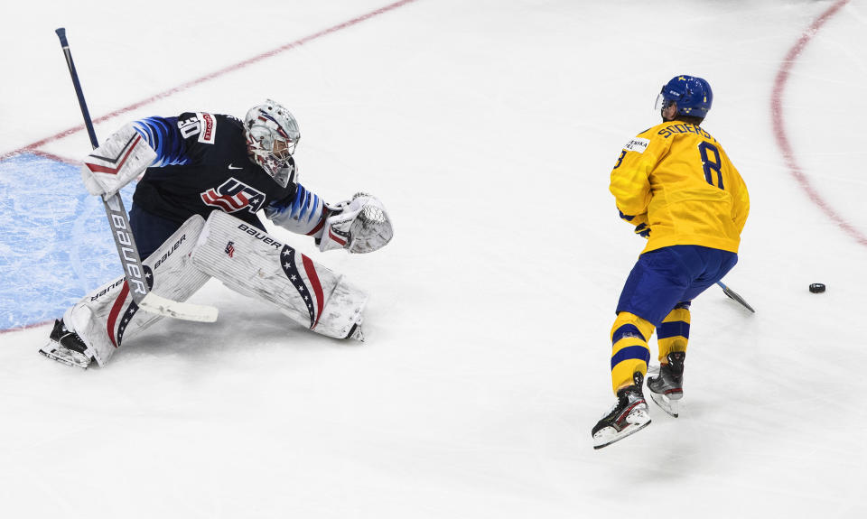 Sweden's Victor Soderstrom (8) loses the puck on a penalty shot against the United States during the second period of an IIHF World Junior Hockey Championship game Thursday, Dec. 31, 2020, in Edmonton, Alberta. (Jason Franson/The Canadian Press via AP)
