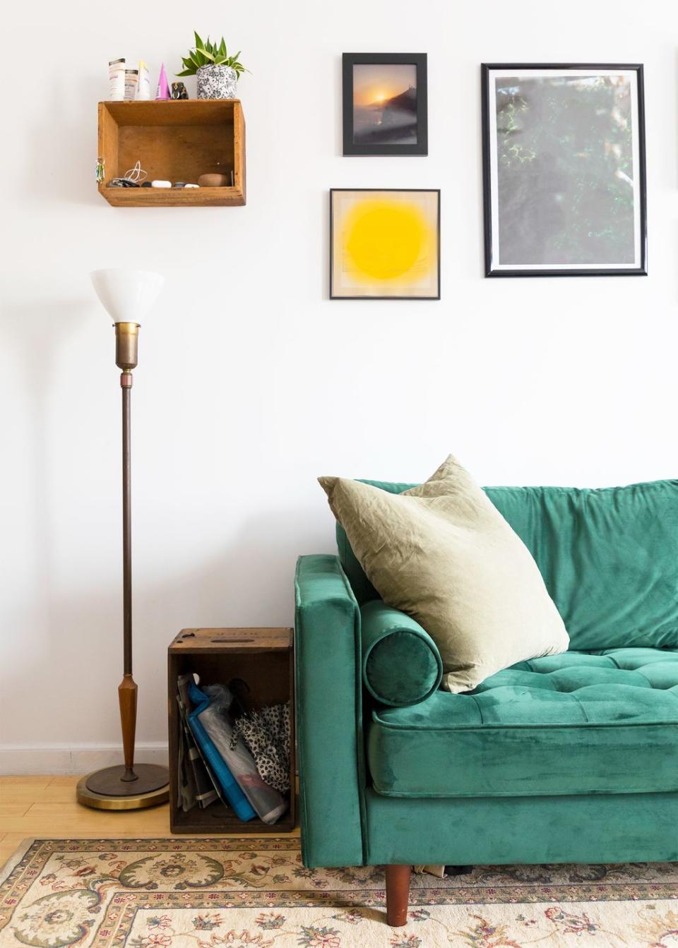 <p>Why settle for floating shelves when you can secure a floating cubby to the wall? In this living room, it strikes the balance between bohemian and polished. </p>