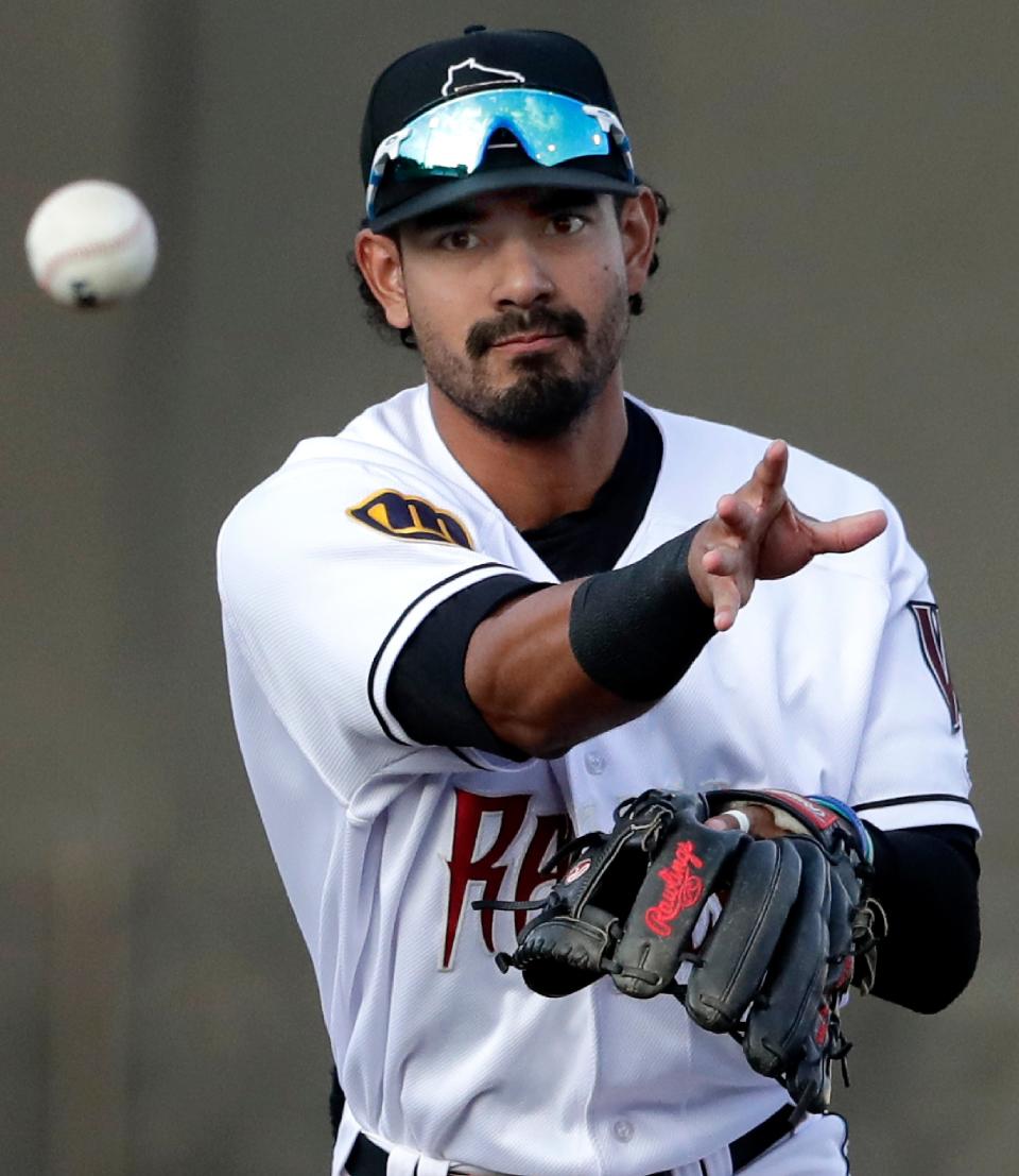 Wisconsin Timber Rattlers infielder Freddy Zamora (9) throws to first base against the Beloit Snappers during their baseball game Tuesday, August 31, 2021, at Neuroscience Group Field at Fox Cities Stadium in Grand Chute, Wis.