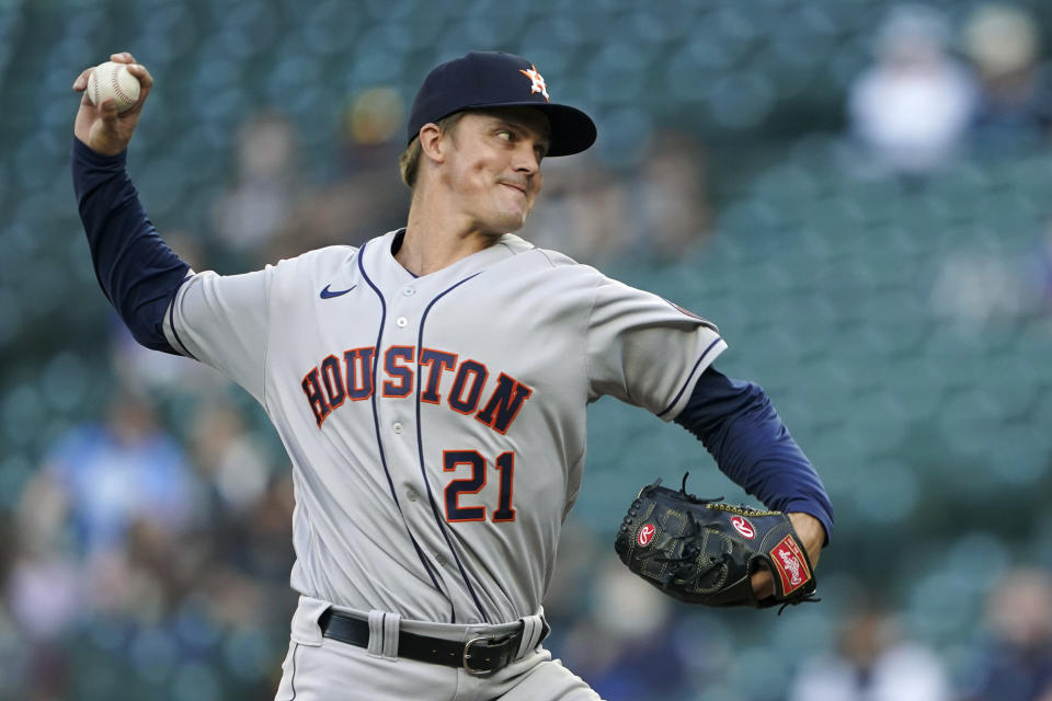 Houston Astros starting pitcher Zack Greinke throws to a Seattle Mariners batter during the first inning of a baseball game Saturday, April 17, 2021, in Seattle. (AP Photo/Ted S. Warren)