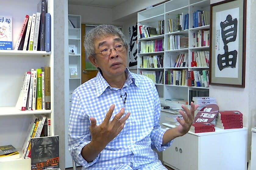Lam Wing-Kee, a Hong Kong bookstore owner who fled to Taiwan in 2019, speaks during an interview inside his bookstore in Taipei, Taiwan on June 8, 2022. Taiwan just 400 miles from Hong Kong, is close not just geographically, but also linguistically and culturally. It offered the freedoms that many Hong Kongers were used to and saw disappearing in their hometown. (AP Photo/Johnson Lai)