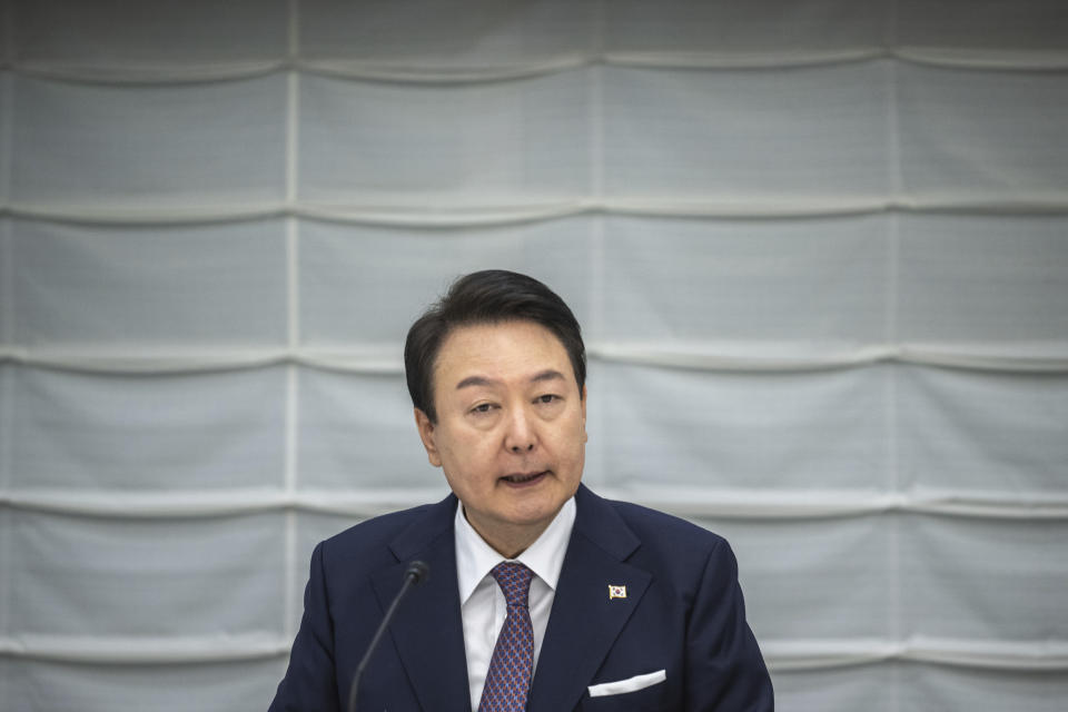 South Korea's President Yoon Suk Yeol attends a meeting between the Japan Business Federation, or Keidanren, and South Korean business leaders during a Japan-Korea Business Roundtable meeting in Tokyo Friday, March 17, 2023. (Philip Fong/Pool Photo via AP)