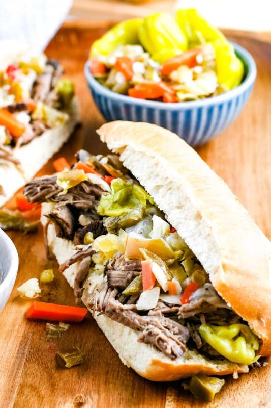 <p>Julie's Eats and Treats</p><p>Slow-cooked beef is piled on buns with cheese and peppers. Grab some extra napkins for this one.<br><br></p><p><strong>Get the recipe: <a href="https://www.julieseatsandtreats.com/italian-beef-sandwiches/" rel="nofollow noopener" target="_blank" data-ylk="slk:Crock Pot Italian Beef Sandwiches;elm:context_link;itc:0;sec:content-canvas" class="link ">Crock Pot Italian Beef Sandwiches</a></strong></p>