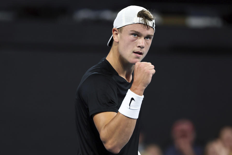 Holger Rune of Denmark reacts after winning a point in his match against Alexander Shevchenko of Russia during the Brisbane International tennis tournament in Brisbane, Australia, Wednesday, Jan. 3, 2024. (AP Photo/Tertius Pickard)