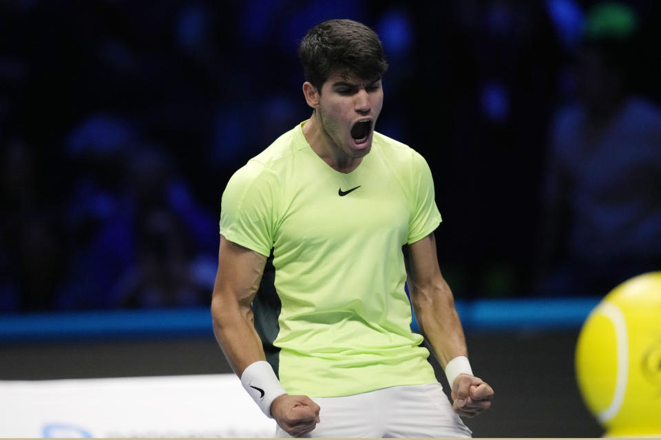 Spain's Carlos Alcaraz celebrates after winning the singles tennis match against Russia's Daniil Medvedev, of the ATP World Tour Finals at the Pala Alpitour, in Turin, Italy, Friday, Nov. 17, 2023. (AP Photo/Antonio Calanni)