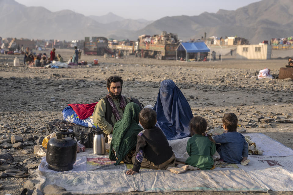 Afghan refugees settle in a camp near the Torkham Pakistan-Afghanistan border in Torkham, Afghanistan, Saturday, Nov. 4, 2023. A huge number of Afghans refugees entered the Torkham border to return home hours before the expiration of a Pakistani government deadline for those who are in the country illegally to leave or face deportation. (AP Photo/Ebrahim Noroozi)