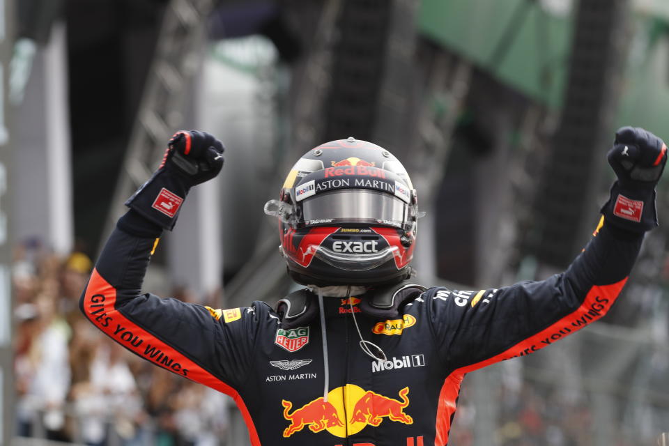 Red Bull driver Max Verstappen, of the Netherlands, celebrates his first place finish in the Formula One Mexico Grand Prix auto race at the Hermanos Rodriguez racetrack in Mexico City, Sunday, Oct. 28, 2018. (AP Photo/Moises Castillo)