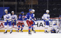 New York Rangers' Alexis Lafreniere (13) celebrates his goal against the Buffalo Sabres during the third period of an NHL hockey game Tuesday, April 27, 2021, in New York. (Bruce Bennett/Pool Photo via AP)