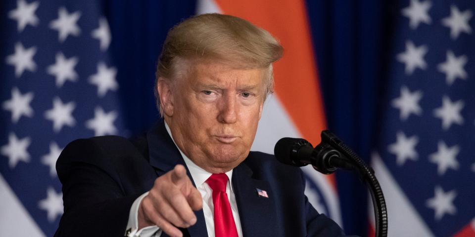 U.S.President Donald Trump points to a question during a news conference, Tuesday, Feb. 25, 2020, in New Delhi, India. (AP Photo/Alex Brandon)