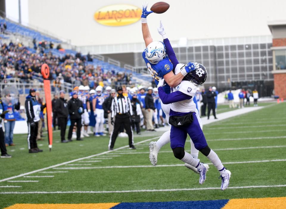 South Dakota State tight end Tucker Kraft leaps in an attempt to score against Holy Cross.
