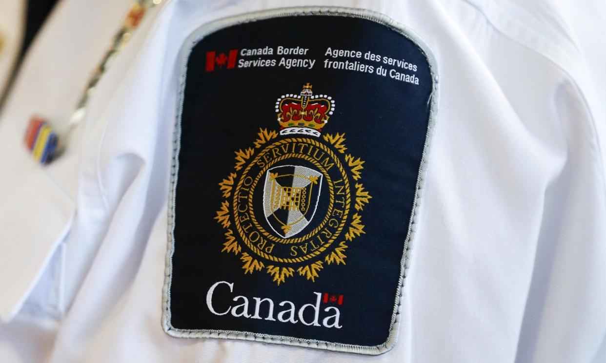 <span>A Canada Border Services Agency (CBSA) logo.</span><span>Photograph: Mark Blinch/Reuters</span>