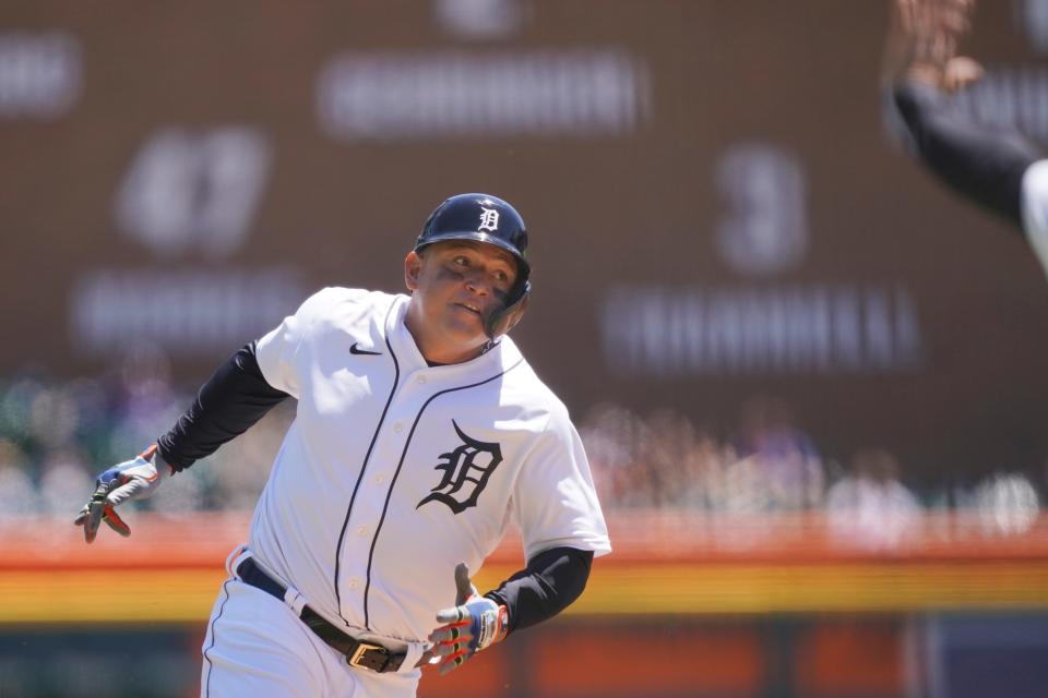 Detroit Tigers' Miguel Cabrera is waved around third to score from first on a double by Nomar Mazara to left field during the first inning of a baseball game against the New York Yankees, Sunday, May 30, 2021, in Detroit.