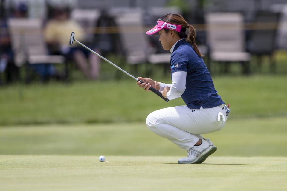 Nasa Hataoka prepares to putt on the 18th hole during the first round of the Meijer LPGA Classic golf tournament at the Blythefield Country Club in Belmont, Mich., Thursday, June 17, 2021. (Cory Morse/The Grand Rapids Press via AP)