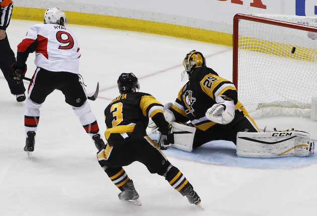 Ottawa Senators’ Bobby Ryan (9) scores [ast Pittsburgh Penguins goalie Marc-Andre Fleury (29) after getting by Olli Maatta (3) during the overtime period of Game 1 of the Eastern Conference final in the NHL hockey Stanley Cup playoffs, Saturday, May 13, 2017, in Pittsburgh. Ottawa won 2-1 in overtime. (AP Photo/Gene J. Puskar)