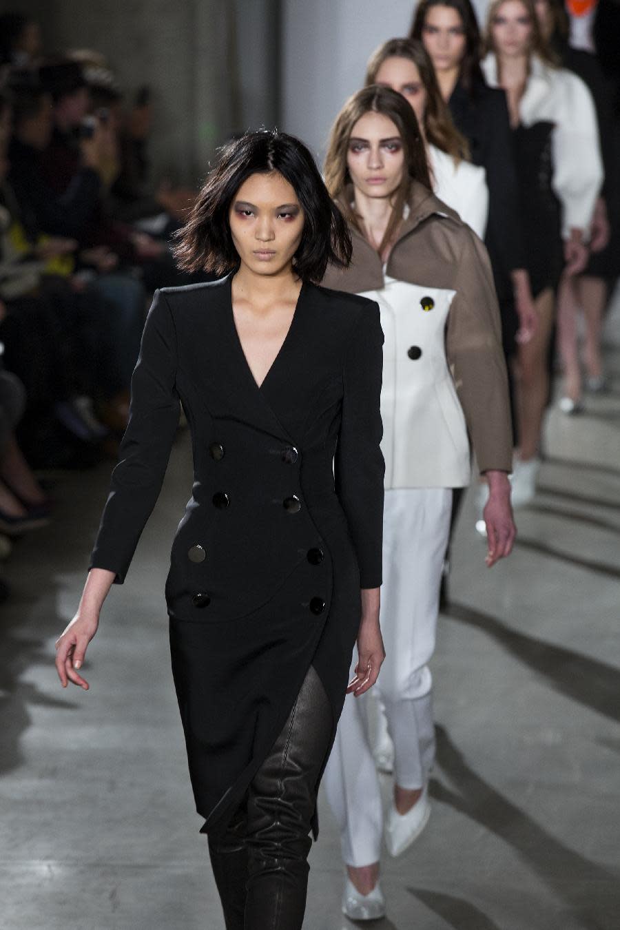 Models walk the runway at the presentation of the Altuzarra Fall 2013 fashion collection during Fashion Week, Saturday, Feb. 9, 2013, in New York. (AP Photo/Craig Ruttle)