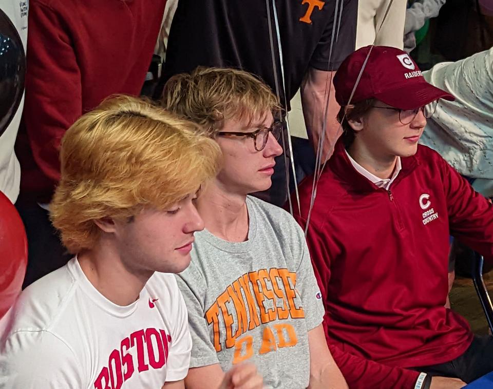 From left, Bolles School cross country athletes Daniel De Monte, Aidan Ryan and Andrew McGraw signed letters of intent during fall signing day on November 9, 2022. [Clayton Freeman/Florida Times-Union]