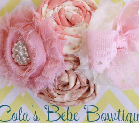 <div class="caption-credit"> Photo by: Lola's Bebe Boutique</div><b>Light Pink Heart Fabric Headband <br></b> For a softer touch, this gorgeous light pink fabric flower headband is perfection. <br> <i><a href="http://www.disneybaby.com/blog/wear-your-heart-on-your-sleeve-20-adorable-handmade-heart-accessories/#slide15" rel="nofollow noopener" target="_blank" data-ylk="slk:Get it here;elm:context_link;itc:0;sec:content-canvas" class="link ">Get it here</a></i> <br>