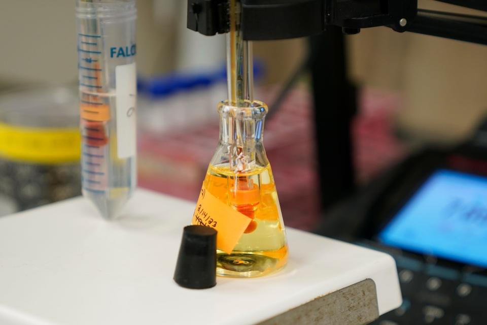 A water sample is measured as part of a PFAS drinking water treatment experiment, Tuesday, Feb. 14, 2023, at the U.S. Environmental Protection Agency Center For Environmental Solutions and Emergency Response in Cincinnati.
