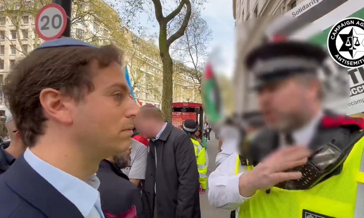 <span>Screengrab from video taken with permission from the social media site X, formerly Twitter, posted by Campaign Against Antisemitism of their chief executive Gideon Falter speaking to a Metropolitan Police during a pro-Palestine march in London.</span><span>Photograph: Campaign Against Antisemitism/PA</span>