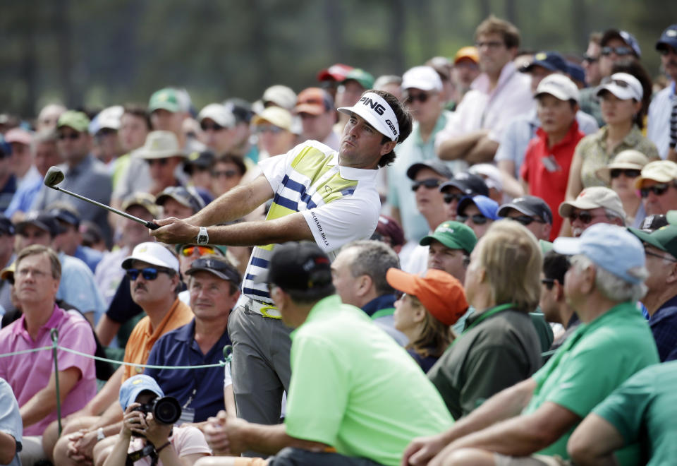 Bubba Watson watches his shot out of the gallery on the 18th hole during the second round of the Masters golf tournament Friday, April 11, 2014, in Augusta, Ga. (AP Photo/Darron Cummings)