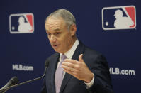Major League Baseball commissioner Rob Manfred speaks to reporters after a meeting of baseball team owners in New York, Thursday, June 20, 2019. The Tampa Bay Rays have received permission from Major League Baseball's executive council to explore a plan that could see the team split its home games between the Tampa Bay area and Montreal, reports said Thursday. (AP Photo/Seth Wenig)
