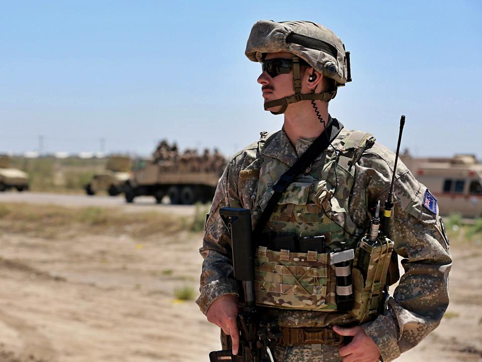 Australian and New Zealand coalition forces participate in a training mission with Iraqi army soldiers at Taji Base, north of Baghdad, Iraq, Wednesday, April 17, 2019. A month after the defeat of the Islamic State group in Syria and Iraq, the U.S.-led international coalition has turned its attention to training Iraqi forces to secure the country against lingering threats posed by IS cells operating in the countryside. (AP Photo/Hadi Mizban)