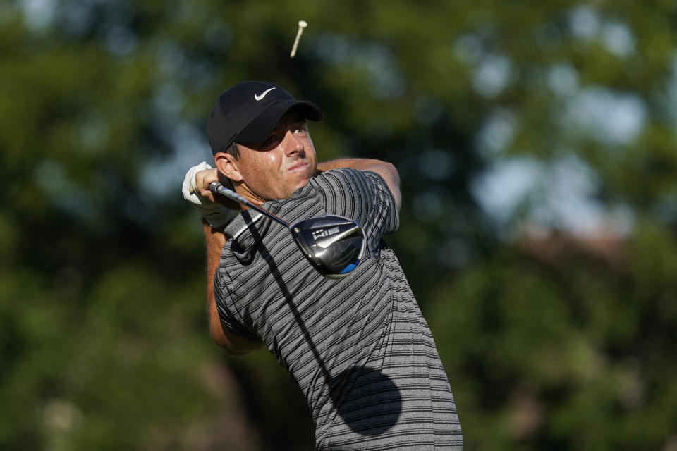 Rory McIlroy, of Northern Ireland, tees off on the 11th hole during the second round of the Charles Schwab Challenge golf tournament at the Colonial Country Club in Fort Worth, Texas, Friday, June 12, 2020. (AP Photo/David J. Phillip)