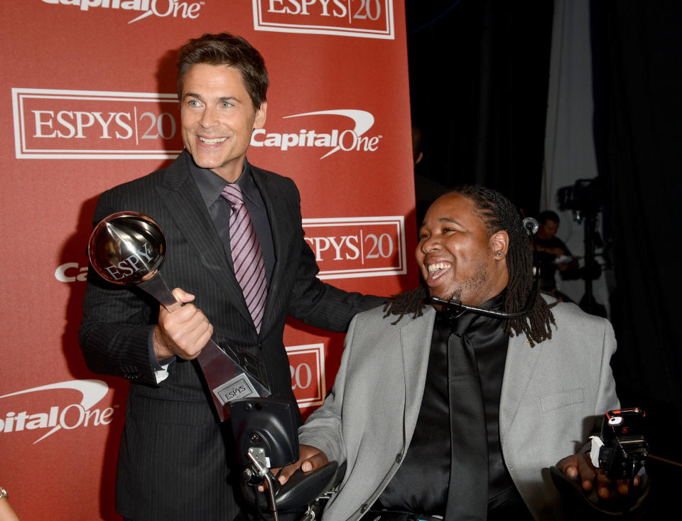 LOS ANGELES, CA - JULY 11: (L-R) Actor Rob Lowe and recipient Eric LeGrand with the Jimmy V Award for perseverance pose backstage during the 2012 ESPY Awards at Nokia Theatre L.A. Live on July 11, 2012 in Los Angeles, California. (Photo by Jason Merritt/Getty Images)