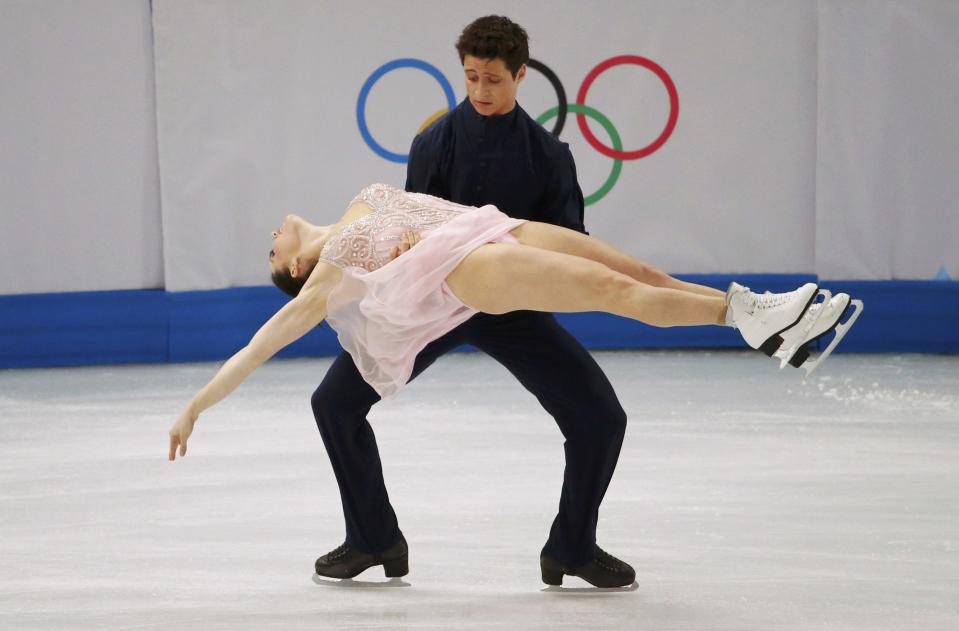 Canada's Tessa Virtue and Scott Moir compete during the Figure Skating Ice Dance Free Dance Program at the Sochi 2014 Winter Olympics