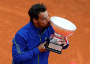 Tennis - ATP 1000 - Monte Carlo Masters - Monte-Carlo Country Club, Roquebrune-Cap-Martin, France - April 21, 2019 Italy's Fabio Fognini celebrates with the trophy after winning the Monte Carlo Masters REUTERS/Jean-Paul Pelissier