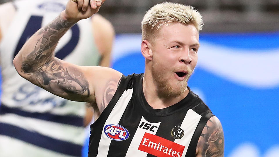 Jordan De Goey is pictured playing for Collingwood in an AFL match.