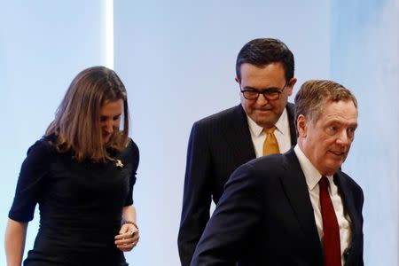 U.S. Trade Representative Robert Lighthizer leaves the room next to Canadian Foreign Minister Chrystia Freeland and Mexican Economy Minister Ildefonso Guajardo after a joint news conference on the closing of the seventh round of NAFTA talks in Mexico City, Mexico March 5, 2018. REUTERS/Edgard Garrido