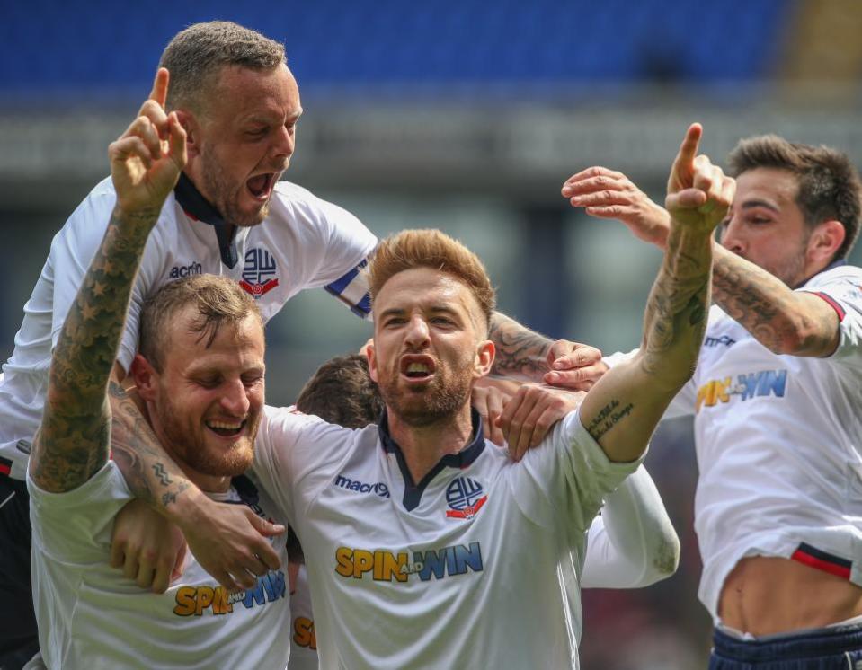 The Bolton News: Wheater after his goal against Posh in 2017