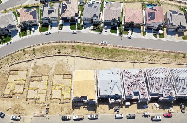 An aerial view of existing homes near new homes under construction in the Chatsworth neighborhood on Sept. 8, 2023, in Los Angeles, California.