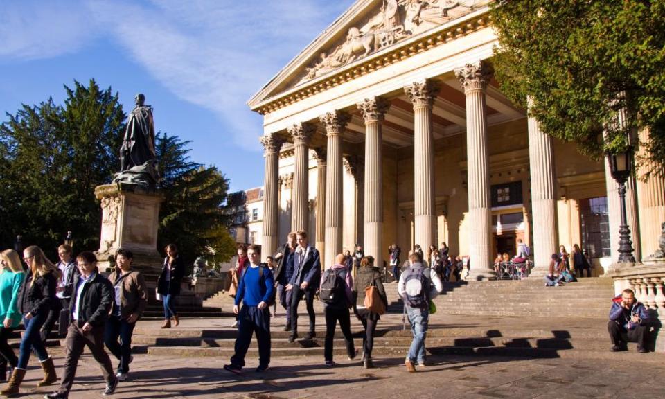 Music Department at University of Bristol Victoria Rooms entrance with students in foreground