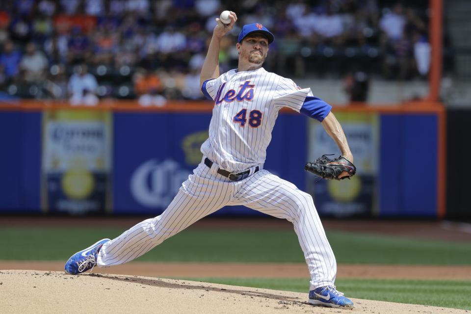 New York Mets' Jacob deGrom delivers a pitch during the first inning of a baseball game against the Washington Nationals, Sunday, Aug. 11, 2019, in New York. (AP Photo/Frank Franklin II)