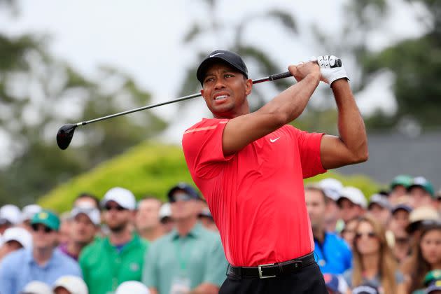 Tiger Woods watches his tee shot on the first hole during the final round of the 2015 Masters Tournament at Augusta National Golf Club on April 12, 2015 in Augusta, Georgia.  (Photo: Jamie Squire via Getty Images)