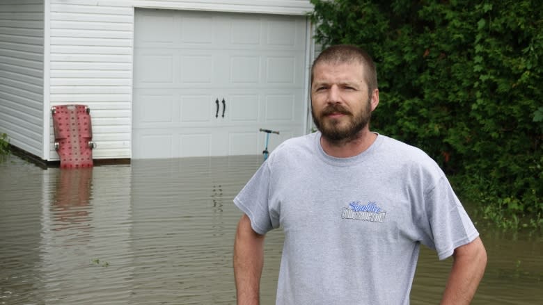 Intense rain floods basements, streets, fields in North Gower