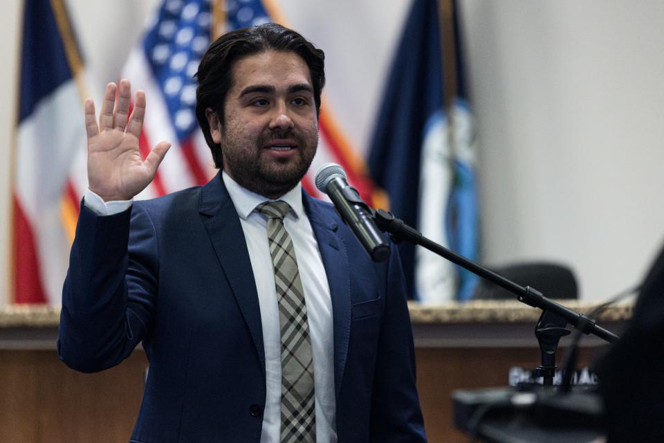 Newly elected District 2 city Rep. Josh Acevedo is sworn in by Judge Josh Herrera on Tuesday, Jan. 30, 2024, at El Paso City Hall.